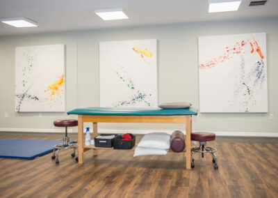 Physical Therapy clinic in Bradenton open gym area with treatment table